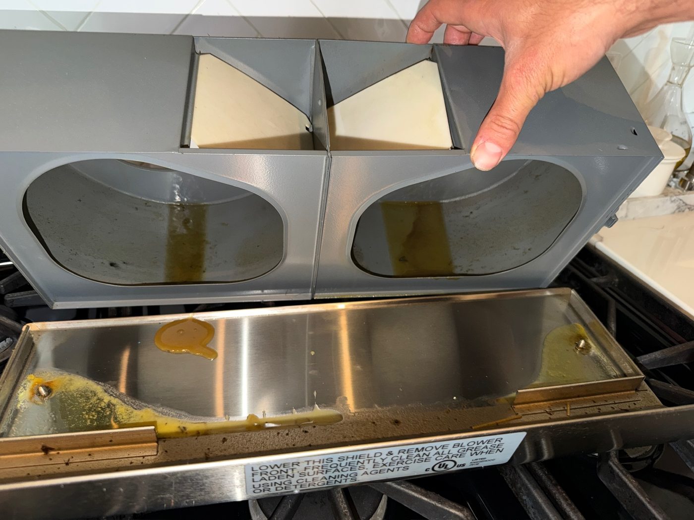 Pulling the grease trough by hand